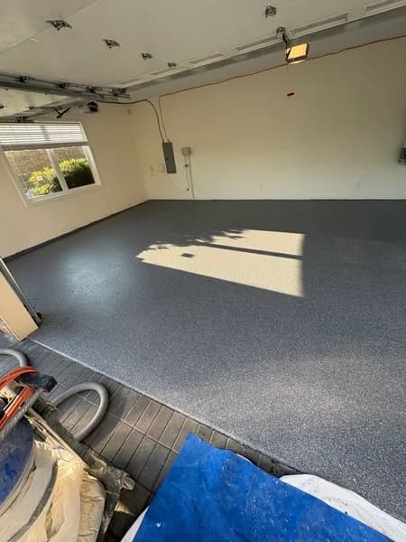 Sunlit Basalt flake epoxy garage floor in Richmond, BC