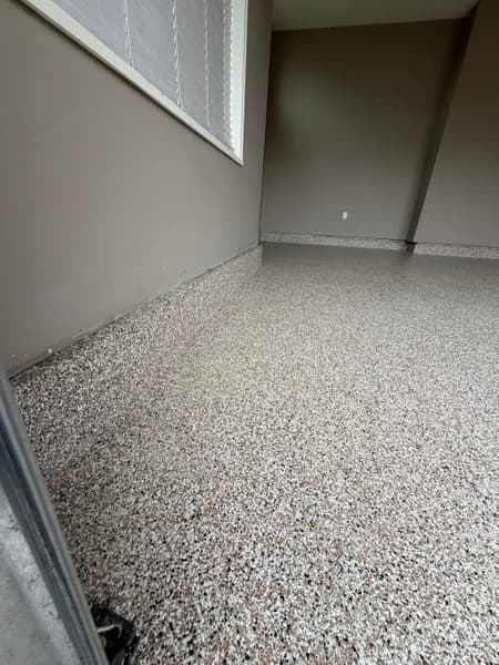 Close-up of Bean flake epoxy texture in an Aldergrove garage