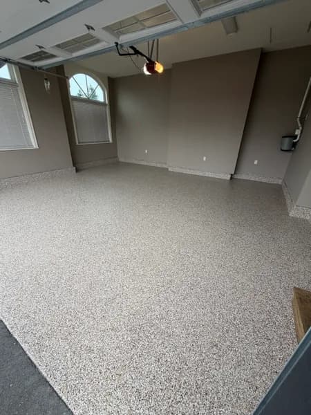 Wide view of a Bean flake epoxy garage floor in Aldergrove, BC