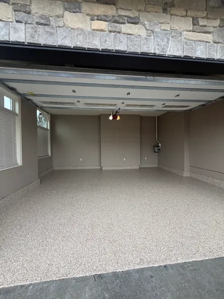Finished Bean flake epoxy floor in an empty garage in Aldergrove, BC