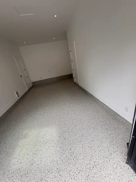 End of a Cabin Fever flake epoxy garage bay in a five-car garage in Langley, BC