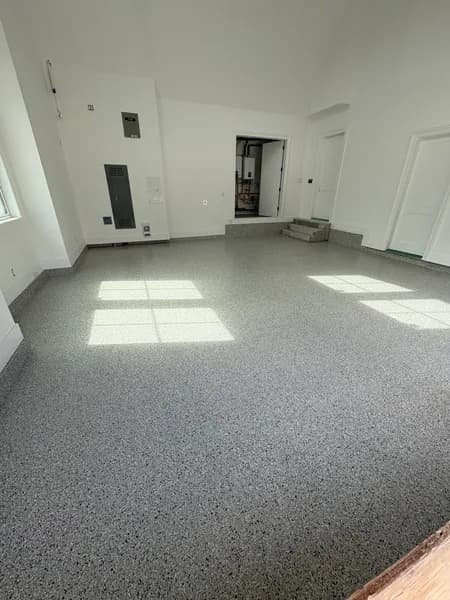 Sunlit Cabin Fever flake epoxy floor in a five-car garage in Langley, BC