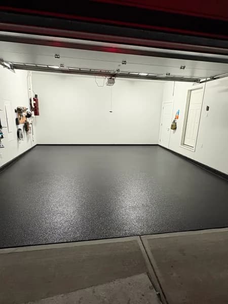 Carbon flake epoxy garage floor at the driveway edge in Delta, BC