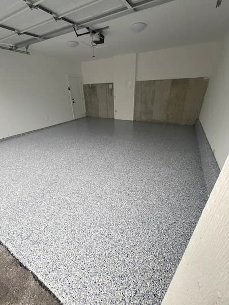 Corner view of a Comet flake epoxy garage floor in Burnaby, BC