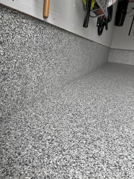 Flake epoxy garage floor with grey blend installed by Go2Epoxy in Metro Vancouver