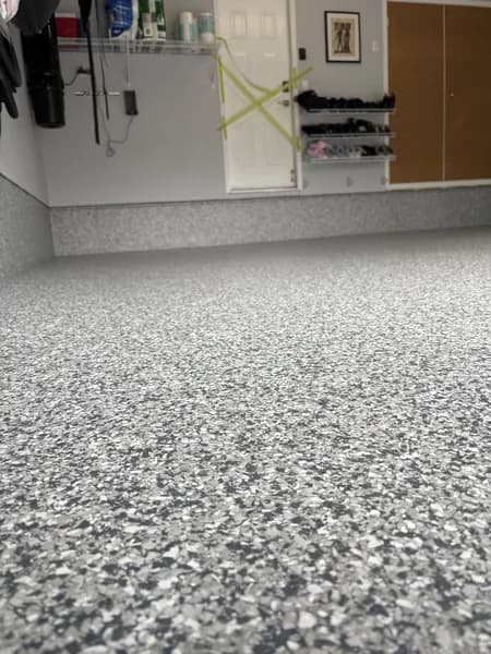 Decorative flake epoxy coating on a residential garage floor