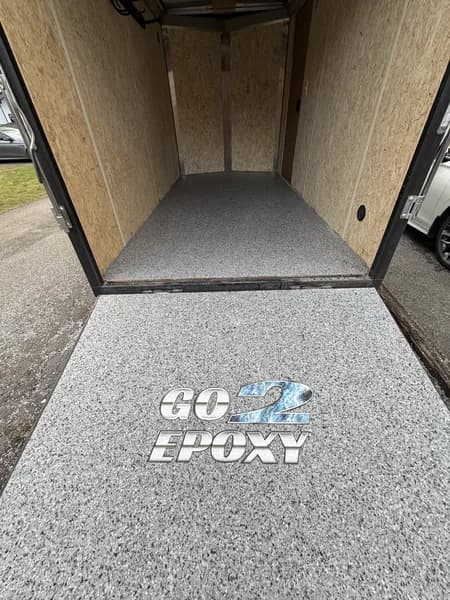Grey and white flake epoxy floor installed in the Fraser Valley