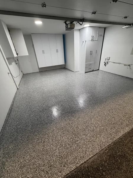 Industrial-grade flake epoxy floor in a high-traffic garage