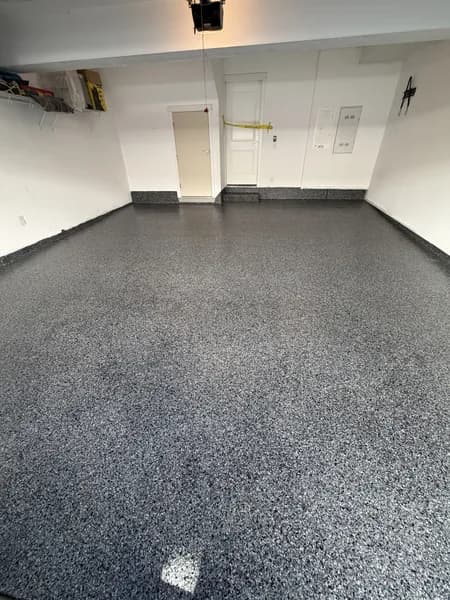 Flake epoxy warehouse floor with impact-resistant coating