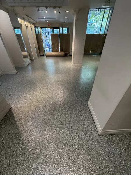Multi-layer flake epoxy floor in a downtown Vancouver workspace