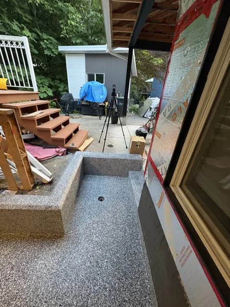 Multi-layer flake epoxy patio system in Squamish