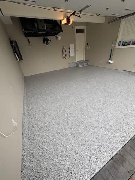 Corner view of a Gravel flake epoxy garage floor in Richmond, BC