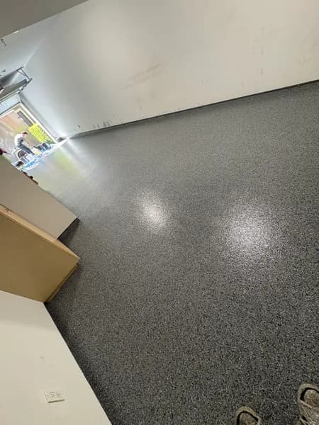 Glossy Nightfall flake epoxy floor in a utility room in Port Coquitlam, BC