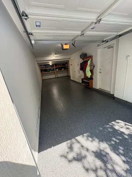 Nightfall flake epoxy corridor floor leading to a garage in Port Coquitlam, BC