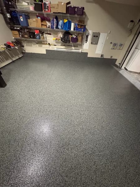 Nightfall flake epoxy garage floor with wall storage in North Delta, BC