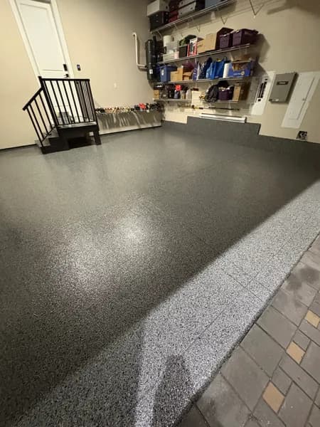 Wide view of a Nightfall flake epoxy garage floor in North Delta, BC