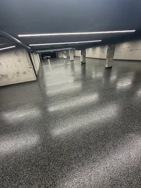 Nightfall flake epoxy floor reflecting LED lights in a 4,000 sq ft private parking garage in Vancouver, BC