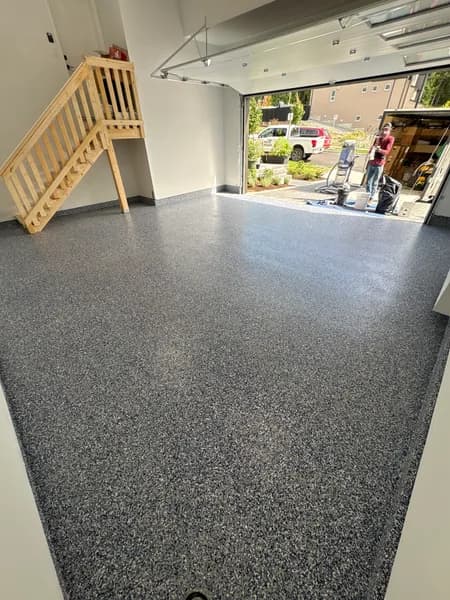 Orbit flake epoxy garage floor with wood stairs in Maple Ridge, BC