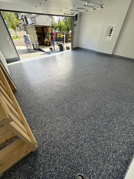Orbit flake epoxy garage floor looking out to the driveway in Maple Ridge, BC