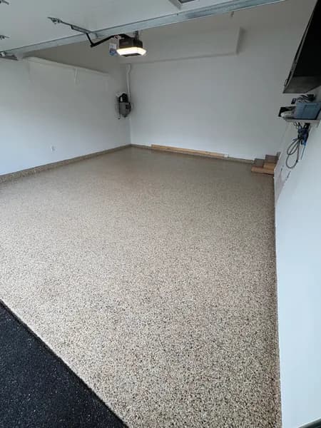 Corner view of an Outback flake epoxy garage floor in Surrey, BC