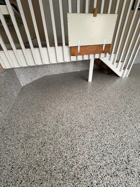Quicksilver flake epoxy garage floor at the base of the stairs in Chilliwack, BC
