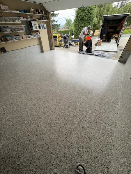 Quicksilver flake epoxy garage floor looking out to the driveway in Chilliwack, BC