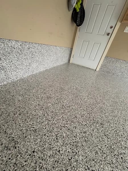 Quicksilver flake epoxy floor by the garage entry door in Chilliwack, BC