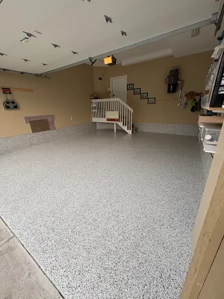 Quicksilver flake epoxy two-car garage floor with entry stairs in Chilliwack, BC
