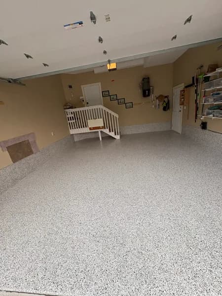 Wide view of a Quicksilver flake epoxy garage floor in Chilliwack, BC