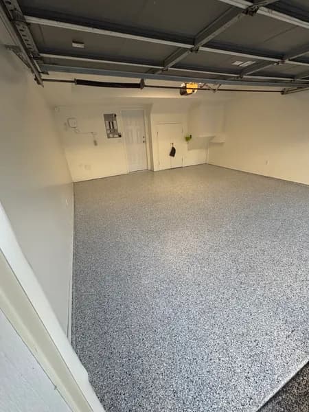 Corner view of a Quicksilver flake epoxy garage floor in Richmond, BC