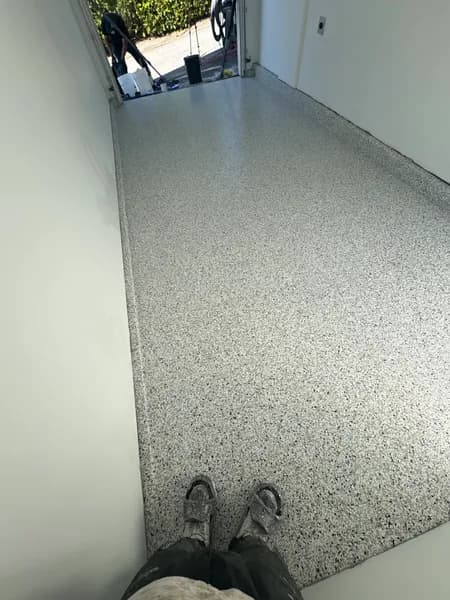 Quicksilver flake epoxy floor in a narrow one-car garage in Vancouver, BC