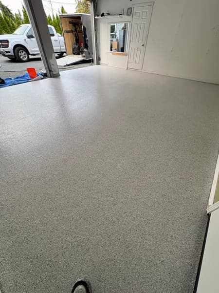Schist flake epoxy garage floor looking out to the driveway in White Rock, BC