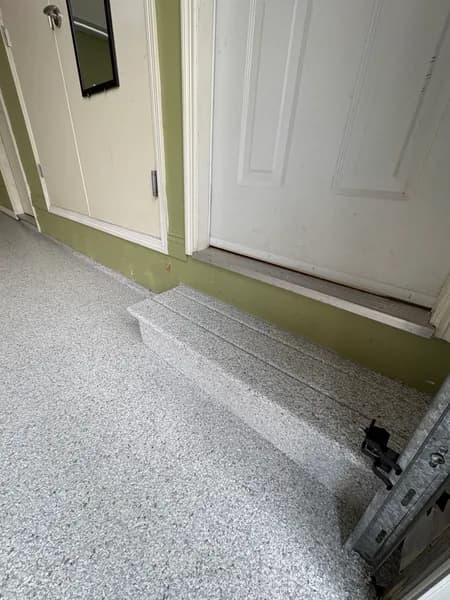Schist flake epoxy steps and landing at a garage entry door in White Rock, BC