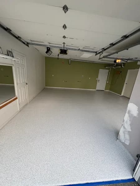 Finished Schist flake epoxy garage floor and back wall in White Rock, BC