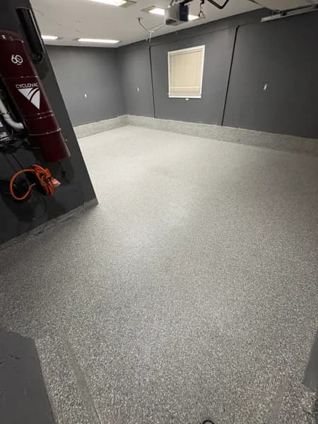 Stoney Creek flake epoxy garage floor with grey walls in North Vancouver, BC