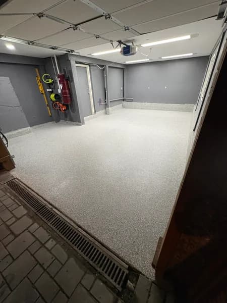 Wide view of a Stoney Creek flake epoxy garage floor in North Vancouver, BC