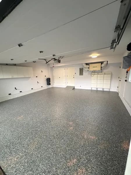Finished Wombat flake epoxy garage floor and back wall in Richmond, BC