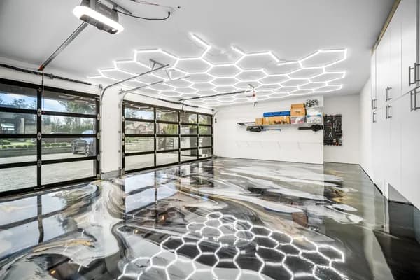 High-gloss metallic epoxy floor coating on a residential garage in Metro Vancouver