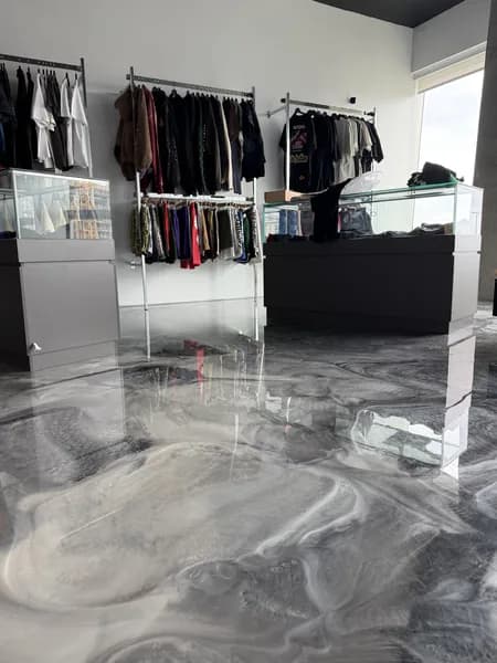 High-gloss metallic epoxy floor in a residential garage