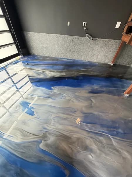 Reflective metallic epoxy garage floor installed in South Surrey