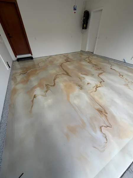 White and gold metallic epoxy garage floor with marble veining in Surrey, BC