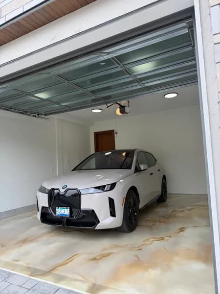 White SUV parked on a white and gold metallic epoxy garage floor in Surrey, BC