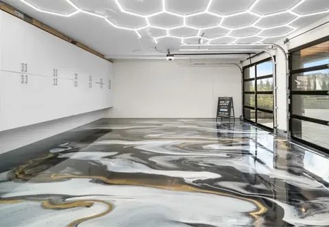Metallic gold epoxy garage floor installed by Go2Epoxy in Vancouver